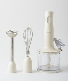 three different types of kitchen appliances on a white background, including an electric hand blender