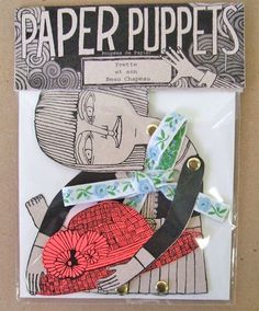 paper puppets are on display in a package