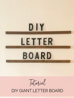 the words diy letter board are made out of wood and have black letters on them