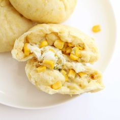 some food on a white plate with corn