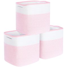 three rolls of pink and white toilet paper