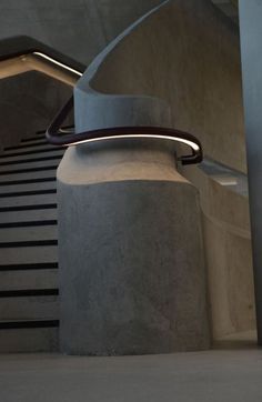 an abstract photo of a staircase with metal railings