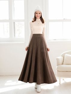 ★★ Welcome to my Ylistyle shop！！！ Embrace the frosty days with this chic A-line, long wool skirt. Perfectly cut for winter, it provides warmth without compromising on style. The high-waisted design exudes a timeless appeal.  ★★FEATURES 35% wool blend, 40% fiber, 25% nylon Polyester lining Back elastic waist Two side pockets Right Zipper closure A-Line wool skirt Maxi wool skirt Long wool skirt Perfect for winter, autumn Dry clean More midi wool skirt: https://etsy.me/3ZmT5UP ★★ Bespoke Order Service If you Request other color Request the length Your height is not between 155 cm- 172 cm Your weight is over 75 kg I can do it for you, It will need some extra fee depending on on your need. Contact with me for more detail. ★★ Get your size in Size Chart with your body measurement https://www.et Winter Pleated Maxi Skirt, Winter Full-length Pleated Skirt, Winter Fitted Lined Maxi Skirt, Fitted Beige Skirt For Winter, Full Length Lined Skirt For Winter, Winter Full Length Lined Skirt, Winter Full Length Fitted Maxi Skirt, Winter Flared Maxi Skirt With Lining, Fitted Beige Maxi Skirt For Fall