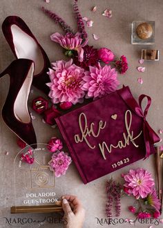 the bride's shoes and bouquets are laid out on the table