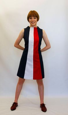 Handmade 1960's style dress in %100 cotton. Made to order from an original 1960's dress pattern, updated to combine contemporary fitting with a retro style. The dress has a back zip and can be made in a variety of plain colours including black and white, red, white and blue in gingham. Can be made in one all-over colour or with contrasting panels as in photos The dress has a high neck and is semi-fitted for a flattering shape. Great for retro, mod, and ska events and parties This dress is fully Modern A-line Cotton Dress, Modern Fitted Cotton Dresses, Modern Cotton A-line Dress, Knee-length Cotton Mini Dress Lined, Retro Cotton Lined Dresses, Retro Fitted Cotton Mini Dress, Retro A-line Mini Dress For Work, Fitted Retro Cotton Mini Dress, Retro Knee-length Cotton Dress