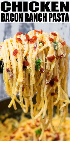 chicken bacon ranch pasta is being lifted from a skillet