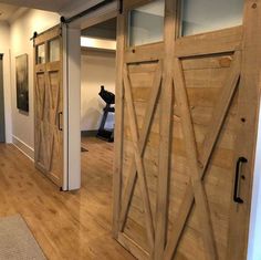 the interior of a home with wood floors and sliding doors