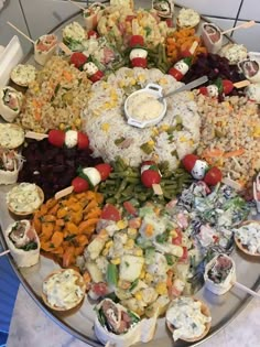 a platter filled with lots of different types of food