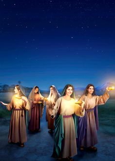 three women dressed as jesus and mary holding torches in their hands with the night sky behind them