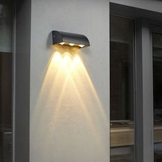 a wall light that is on the side of a building