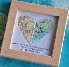 two maps in a wooden frame with the words true love doesn't mean being inseporably