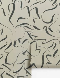 an abstract wallpaper with black and white lines on it's side, in front of a beige background