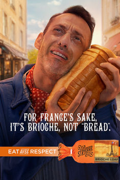 a man holding a large loaf of bread in front of his face with the caption for france's sake, it's brioche, not bread