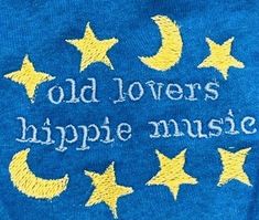 an old lover's hippie music t - shirt with stars and crescents