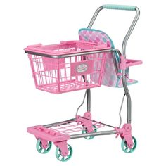 a pink shopping cart with blue wheels and a basket on the front, sitting upright against a white background