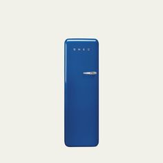 a blue refrigerator sitting on top of a white wall