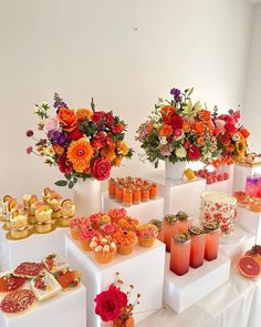 there are many different types of food on the table together, including cupcakes and muffins