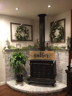 an old fashioned stove in the corner of a room with potted plants on it