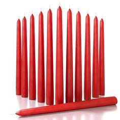 several red candles lined up next to each other