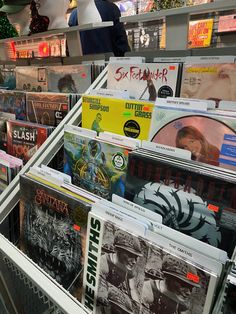 there are many records on display in the store