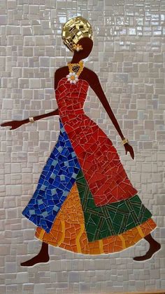 a woman in a colorful dress is depicted on a mosaic tile wall