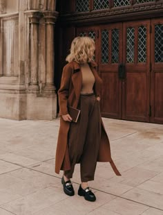 25 Dark Academia Outfits Perfect For A Scholarly Look Aesthetic Fall Winter Outfits, Dark Academia Coat Outfit, Fashion Outfits Dark Academia, Brown And Black Striped Sweater Outfit, Dark Academia Outfit Shoes, Style Inspiration Dark Academia, Musical Academia Outfit, Dark Academia Lawyer, Dark Academia Simple Outfit