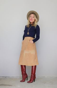 "Perfect for fall suede skirt in women's size xxs/xs (24\" waist).  High, fixed waistband with snap and zipper closure.  Cute tulip shaped pockets.  Lined in acetate.  Genuine suede leather in a light camel tan color.  The skirt's body is in great vintage condition.  The suede has a section of fading on the front that creates a multi-tone tan color (see discoloration on pics for this flaw). Brand: Casual Corner Size: Labeled a 7; Would best fit a modern xxs to smaller xs.  FOR REFERENCE: I am 5' Suede Pencil Skirt Outfit, A Line Leather Skirt Outfit, Fitted Suede Skirt For Fall, Suede Knee Length Skirt, Tan Skirt Outfits, Fall Suede, Brown Suede Skirt Western, Suede Midi Skirt