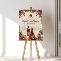 an easel with a wedding card on it