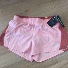 Nike 10k Shorts In Light Pink Color Lined Brief Women’s Size Medium New With Tags Never Worn Nike Shorts With Built-in Liner For Spring, Nike Athletic Shorts For Spring, Nike Shorts For Spring, Nike Summer Activewear Shorts, Nike Summer Workout Shorts, Nike Spring Activewear Shorts, Nike Spring Activewear, Summer Nike Shorts, Pink Athletic Shorts With Pockets For Spring