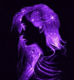 the silhouette of a woman with purple hair and stars on her face is shown against a black background