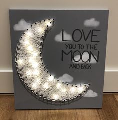 a string art moon with the words love you to the moon and back