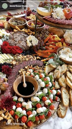 a table filled with lots of different types of food