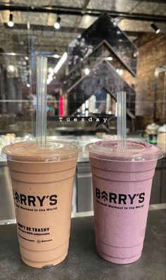 two drinks sitting next to each other on a counter