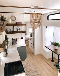 the kitchen is clean and ready to be used as a living room or dining area