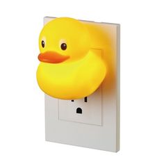 a yellow rubber ducky sitting on top of a light switch