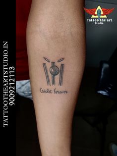 a person with a tattoo on their leg that says cuisine feueron and two forks