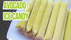 several pieces of food on a white plate with the words avocado ice candy