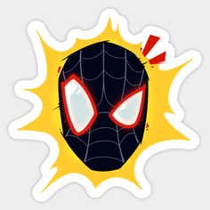 a spider - man mask with red eyes and yellow flame around it's face