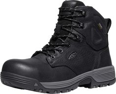 a pair of black work boots with laces on the outstep and toe