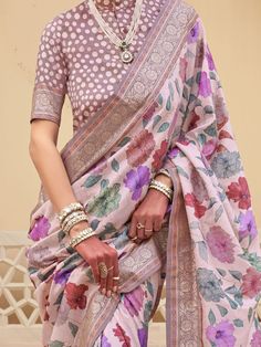 This fascinating baby pink floral printed silk traditional saree with blouse is a stunning choice for weddings, festivals, and other special occasions. The vibrant baby pink color of the saree, paired with the intricate floral print work and zari weaving, makes it a standout piece that is sure to turn heads wherever you go.
The saree comes with a matching light brown color silk blouse that also features printed work and zari weaving, adding to the overall elegance and charm of the ensemble. The Floral Print Traditional Drape For Eid, Festive Pink Silk Pre-draped Saree, Traditional Pre-draped Saree With Floral Print For Eid, Floral Print Traditional Wear For Wedding And Navratri, Traditional Floral Pre-draped Saree For Eid, Traditional Wear With Floral Print For Wedding And Navratri, Bollywood Floral Print Traditional Wear For Wedding, Bollywood Style Traditional Wear With Floral Print For Wedding, Bollywood Style Floral Traditional Wear For Weddings