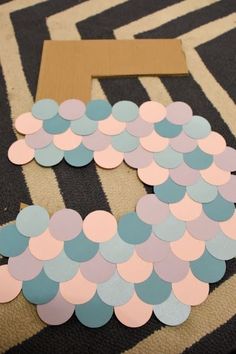 paper circles cut out to look like a fish