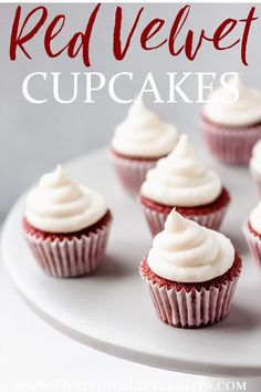 red velvet cupcakes with white frosting on a cake platter and text overlay