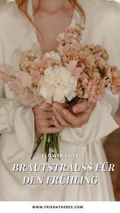 a woman holding a bouquet of flowers in her hands with the words flower love brautstrauss fur den fruhing