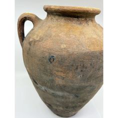 Ancient Roman terracotta wine pitcher or vessel that has the rare signature mark of the ancient artist.   A unique piece of ancient history dating back to 200 AD. This vase had been excavated and unearthed in Rome. Once used by the ancient Roman people.   This treasure can now be displayed in your home.   Certificate of authenticy included. Wine Pitcher, Ancient Romans, Ancient History, Rome, Unique Pieces, Vase, Wine, History