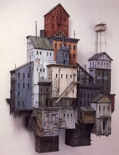 an art piece made out of old buildings and stairs with a water tower in the background