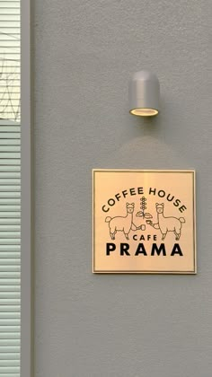 a sign on the side of a building that says coffee house ca'e prama