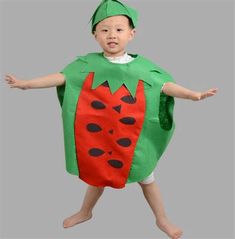 a little boy in a costume that looks like a carrot