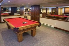 a pool table in the middle of a room