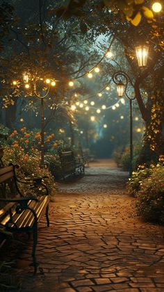 a park bench sitting on top of a cobblestone road next to trees and lights