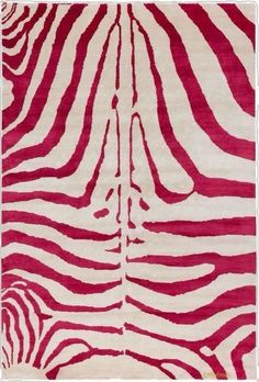 a red and white rug with zebra stripes